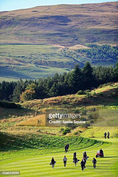 General view as United States team members walk down the 9th fairway ahead of the 2014 Ryder Cup on the PGA Centenary course at the Gleneagles Hotel...