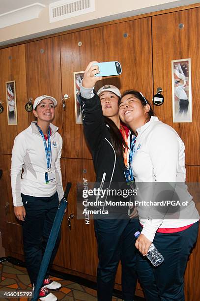 Women of the USA Junior Ryder Cup Team take selfies in the locker room during a practice round for the 40th Ryder Cup at Gleneagles, on September 24,...