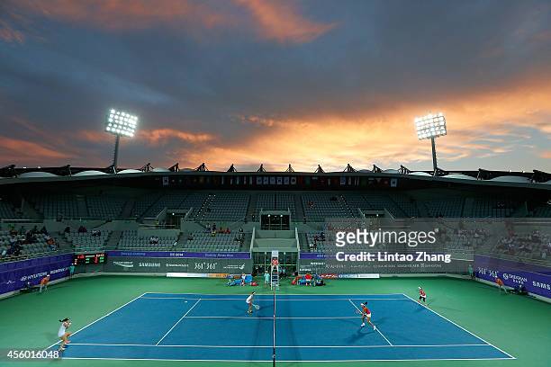 Chan Yung Jan and Hsieh Su Wei of Chinese Taibei play a shot during the Women's Team Gold Medal Match against Zhang Shuai and Zheng Jie of China...