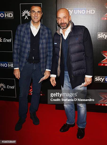 Giuseppe Bergomi and Gianluca Vialli attend "X Factor 2013 - The Final" Red Carpet on December 12, 2013 in Milan, Italy.