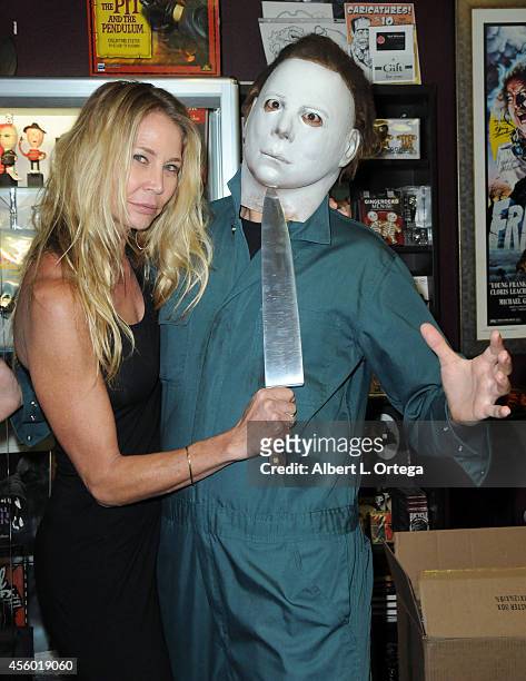 Actress Kathleen Kinmont with Michael Myers at the signing for entire "Halloween" complete BluRay collection from Anchor Bay Entertainment and Scream...