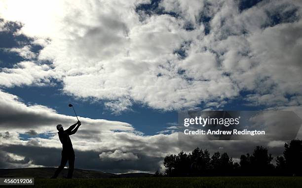 Henrik Stenson of Europe tees off on the 14th hole during practice ahead of the 2014 Ryder Cup on the PGA Centenary course at the Gleneagles Hotel on...