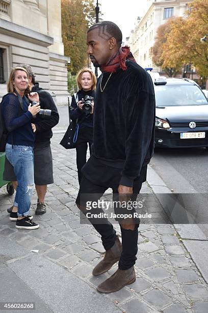 Kanye West arrives at Dries Van Noten Fashion Show during Paris Fashion Week, Womenswear SS 2015 on September 24, 2014 in Paris, France.