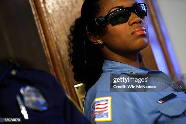 Washington DC Metropolitan Police Officer JaShawn Colkley wears one of the new "body-worn cameras" that the city's officers will begin using during a...