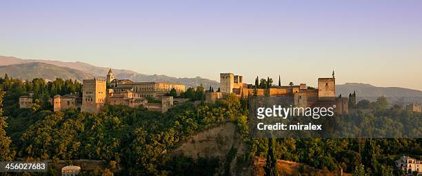 alhambra golden hour panorama in granada, spain - granada spain landmark stock pictures, royalty-free photos & images