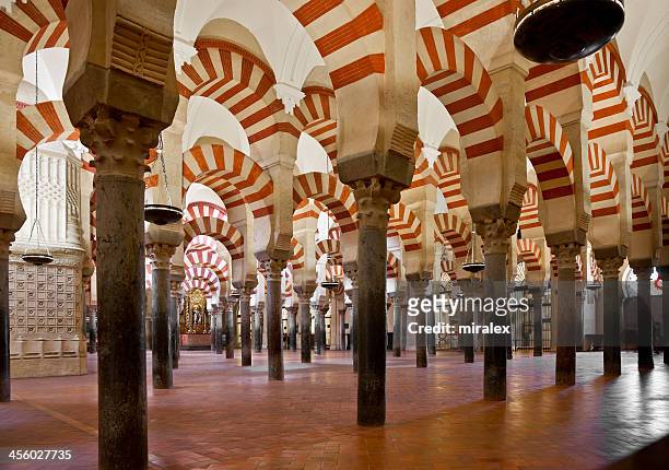 the interior of the mosque cathedral of cardoba in spain - mezquita stock pictures, royalty-free photos & images