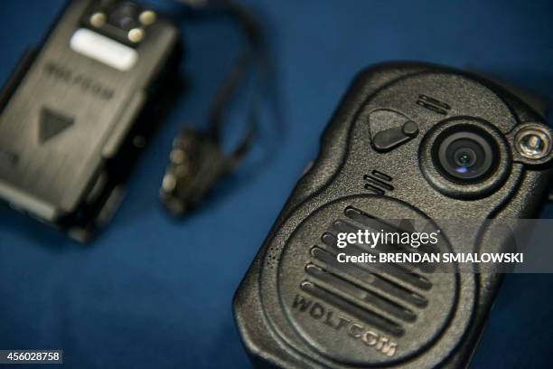 Combination body camera radio microphone from Wolfcam is seen during a press conference at City Hall September 24, 2014 in Washington, DC. The...