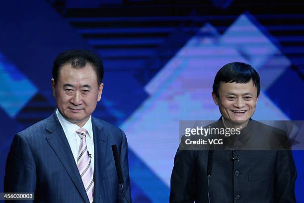 Jack Ma , Chairman of Alibaba Group, and Wang Jianlin, Chairman of Dalian Wanda Group, attend the 2013 CCTV's China Economic Person Of The Year Award...