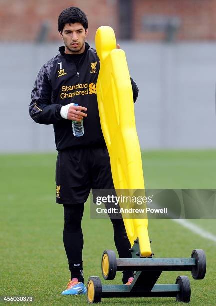 Luis Suarez of Liverpool during a training session at Melwood Training Ground on December 13, 2013 in Liverpool, England.