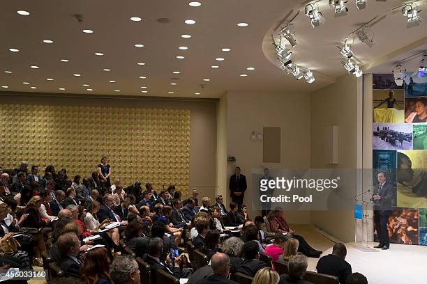 British Prime Minister David Cameron speaks during a high-level meeting at the Ford Foundation on post-2015 anti-poverty goals, on September 24 in...