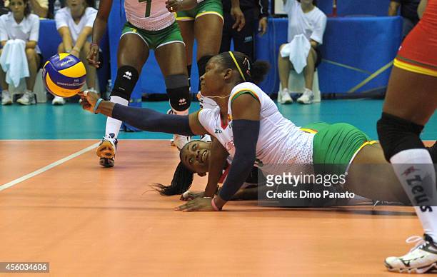Berthrade Simone Flore Bikatal of Camerron makes a save during the FIVB Women's World Championship pool B match between Cameroon and Brazil on...