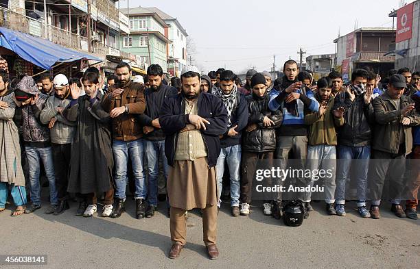 Kashmiri people perform absentee funeral prayer for Bangladesh Jamaat-e-Islami Assistant Secretary Abdul Quader Mollah a day after his execution on...