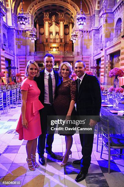 Sergio Garcia of Europe and partner Katharina Boehm pose with Henrik Stenson of Europe and wife Emma Stenson during the 2014 Ryder Cup Gala Dinner at...