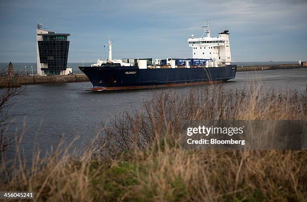 The Hildasay Ro-Ro ferry, operated by NorthLink Ferries Ltd., passes a control tower as it enters Aberdeen Harbour, operated by the Aberdeen Harbour...