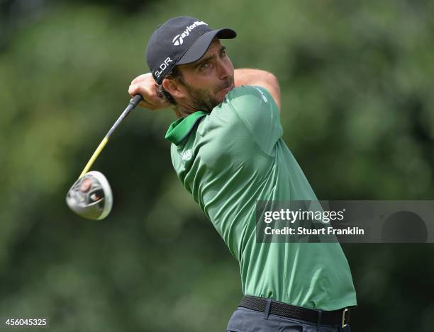 Edoardo Molinari of Italy plays a shot during the weather delayed second round of the Nelson Mandela Championship at Mount Edgecombe Country Club on...