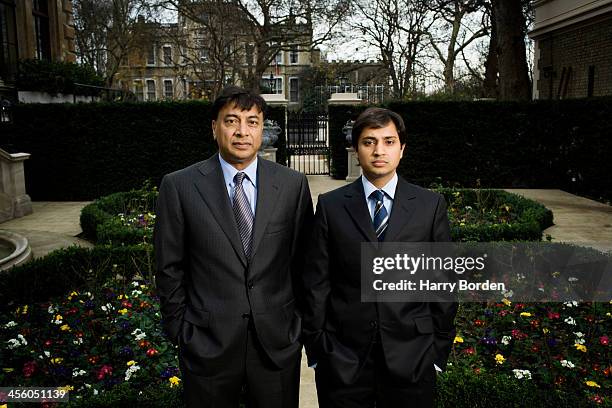 Businessman Lakshmi Mittal is photographed with his son Aditya Mittal for Fortune magazine on December 15, 2006 in London, England.