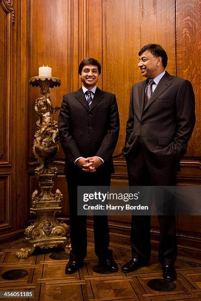 Businessman Lakshmi Mittal is photographed with his son Aditya Mittal for Fortune magazine on December 15, 2006 in London, England.