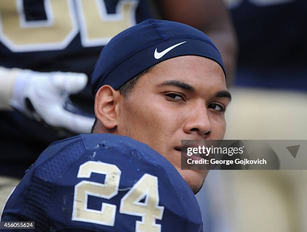 Tailback James Conner of the University of Pittsburgh Panthers looks on from the sideline during a college football game against the University of...