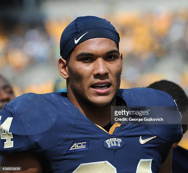 Tailback James Conner of the University of Pittsburgh Panthers looks on from the sideline during a college football game against the University of...