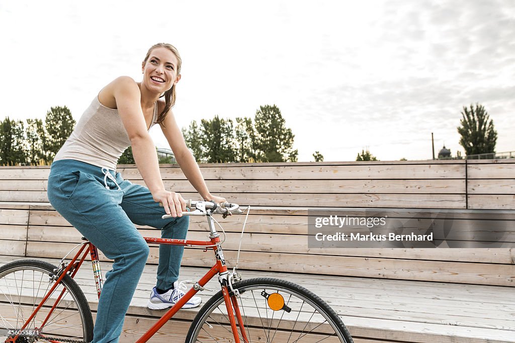 Sporty woman on bicycle