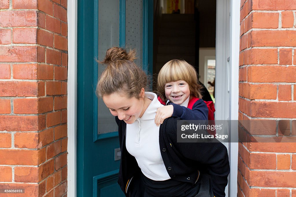 Brother and Sister on their way to school