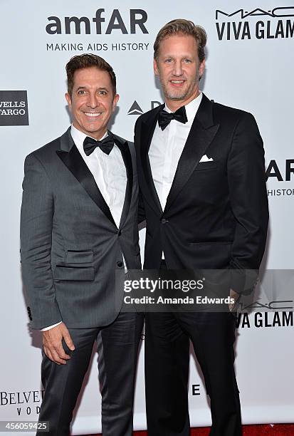 Mark Brashear and Ward Simmons arrive at amfAR The Foundation for AIDS 4th Annual Inspiration Gala at Milk Studios on December 12, 2013 in Hollywood,...