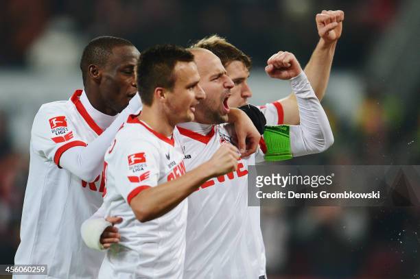 Miso Brecko of 1. FC Koeln celebrates with teammates after scoring his team's third goal during the Second Bundesliga match between 1. FC Koeln and...