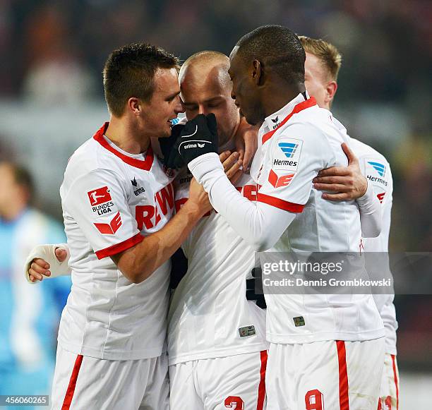 Miso Brecko of 1. FC Koeln celebrates with teammates after scoring his team's third goal during the Second Bundesliga match between 1. FC Koeln and...