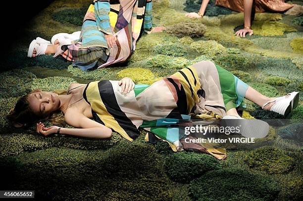 Model walks the runway during the Dries Van Noten Ready to Wear show as part of Paris Fashion Week Womenswear Spring/Summer 2015 on September 24,...