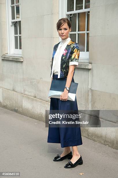 Fashion Stylist Verity Megan is wearing a Merchant Arc top and bag, Acne trousers and Simone Rocha shoes on day 5 of London Collections: Women on...