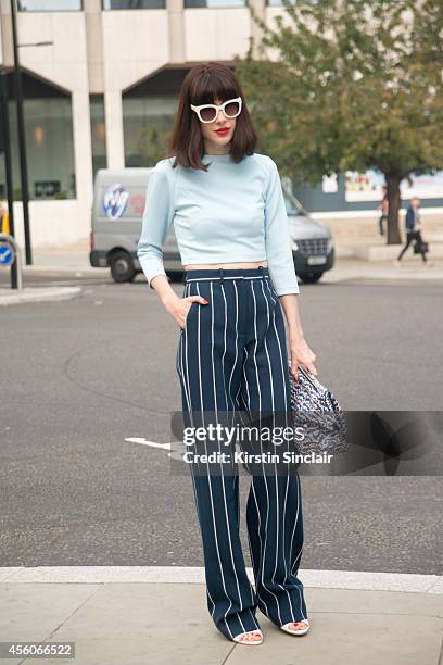 Fashion Stylist & Brand Consultant Natalia Ferviu is wearing a Bimba and Lola bag and trousers, Miranda for Lydia top, vintage sunglasses and Moises...