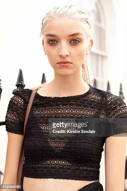 Model Kate Howat is wearing a Topshop top on day 5 of London Collections: Women on September 16, 2014 in London, England.