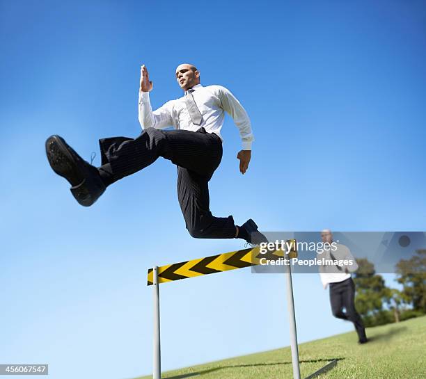 he'll jump over every obstacle - hurdle stock pictures, royalty-free photos & images