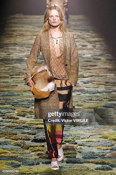 Model walks the runway during the Dries Van Noten Ready to Wear show as part of Paris Fashion Week Womenswear Spring/Summer 2015 on September 24,...