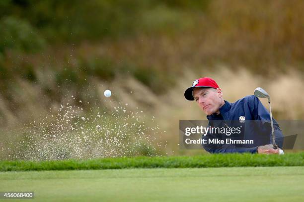 Jim Furyk of the United States plays out of a bunker during practice ahead of the 2014 Ryder Cup on the PGA Centenary course at the Gleneagles Hotel...