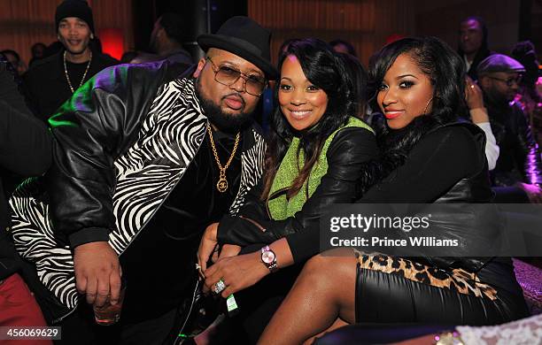 Jazzy Pha, Monica and Antonia "Toya" Wright attend a party at Vanquish Lounge on December 12, 2013 in Atlanta, Georgia.