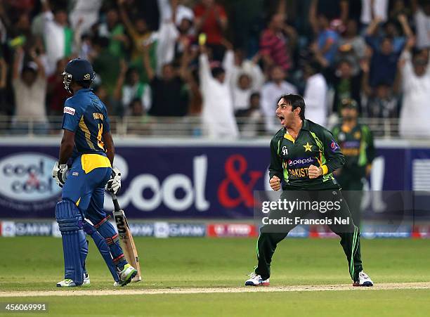 Saeed Ajmal of Pakistan celebrates during the second Twenty20 International match between Pakistan and Sri Lanka at Dubai Sports City Cricket Stadium...