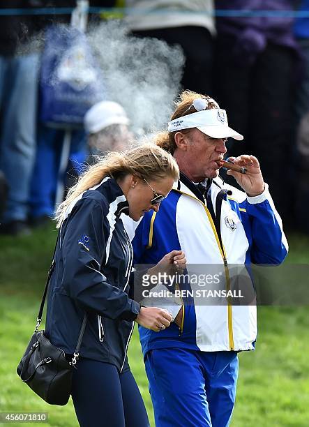 Vice Captain of Team Europe Miguel Angel Jimenez of Spain and his wife Susanna Styblo are pictured during a practice session at the Gleneagles golf...