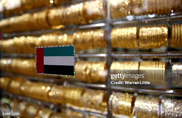 Golf jewllery is pictured at the Dubai Gold Souk on September 25, 2014 in Dubai, United Arab Emirates.