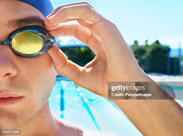 driven to sporting excellence - swimming gala stock pictures, royalty-free photos & images