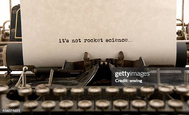it's not rocket science... - vintage typewriter stock pictures, royalty-free photos & images