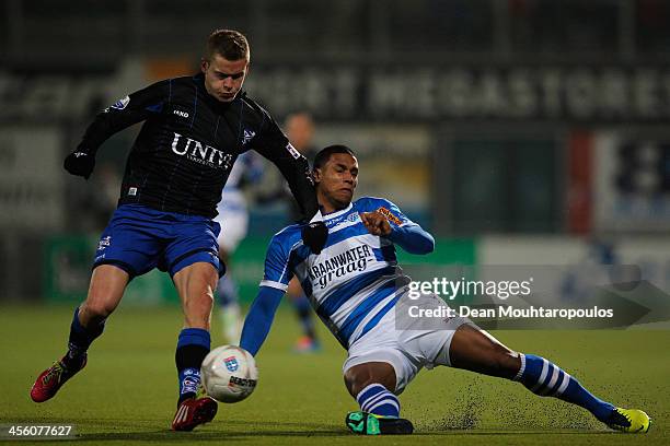 Darryl Lachman of Zwolle and Alfred Finnbogason of Heerenveen battle for the ball during the Eredivisie match between PEC Zwolle and SC Heerenveen...
