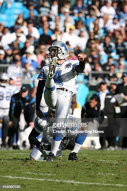 Jason Hanson of the Detroit Lions kicks a field goal on hold by Nick Harris during a game against the Carolina Panthers on November 16, 2008 at the...