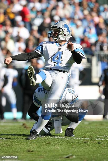 Jason Hanson of the Detroit Lions kicks a field goal on hold by Nick Harris during a game against the Carolina Panthers on November 16, 2008 at the...