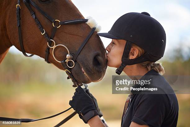 there is a bond between horse and rider - riding stockfoto's en -beelden