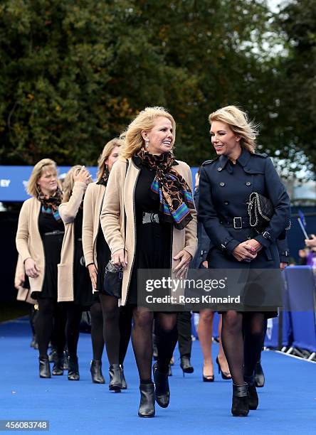 Hilary Watson , wife of United States team captain Tom Watson talks to Allison McGinley, wife of Europe team captain Paul McGinley prior to the...