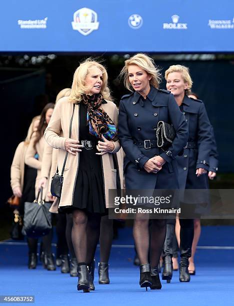 Hilary Watson , wife of United States team captain Tom Watson talks to Allison McGinley, wife of Europe team captain Paul McGinley prior to the...