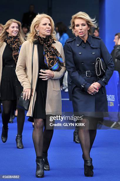 Hilary Watson , wife of United States team captain Tom Watson, talks to Allison McGinley, wife of Europe team captain Paul McGinley, before the start...