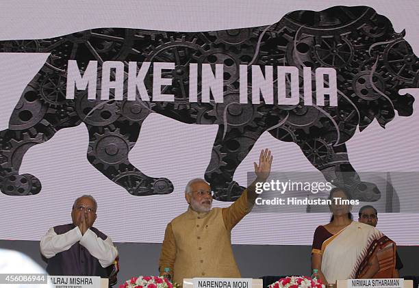 Prime Minister Narendra Modi with Minister of state for Commerce and Industry Nirmala Sitharaman and Minister of Micro, Small and Medium Enterprises...