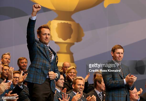 Ian Poulter and Stephen Gallacher of Europe are announced as playing partners for their opening fourball match during the Opening Ceremony ahead of...